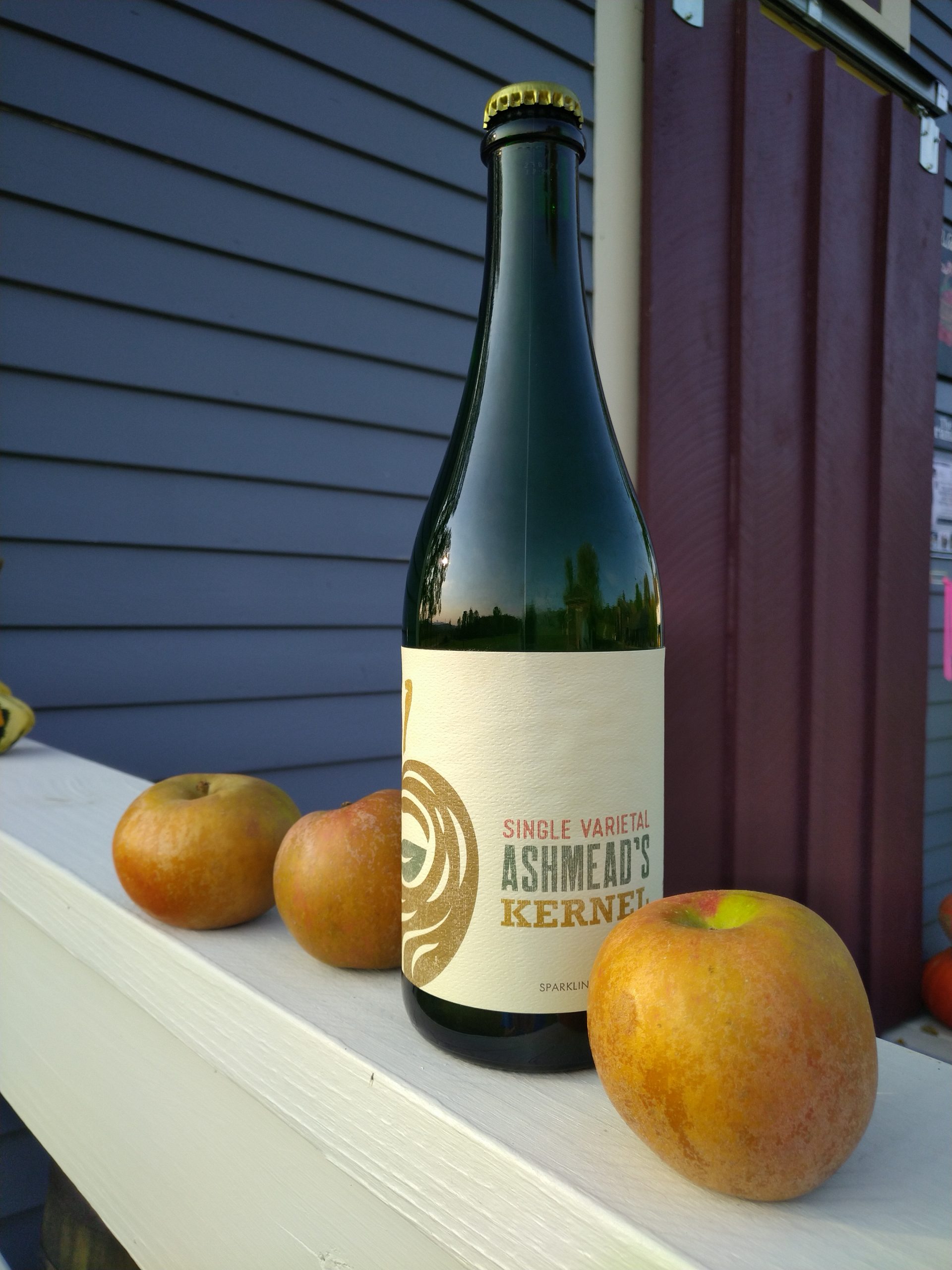 Ashmeads bottle and apples Bottle of Ashmeads and apples